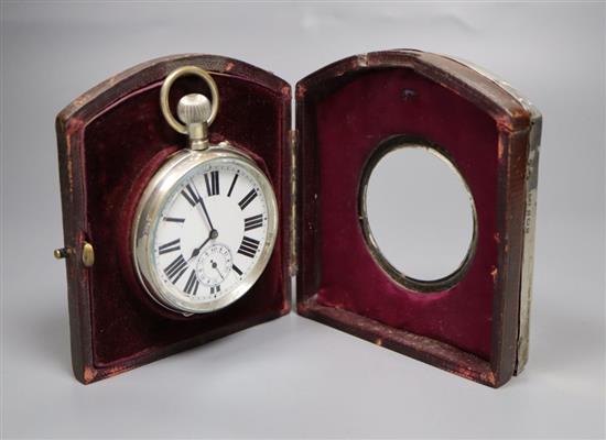 An Edwardian planished silver mounted travelling watch case, with pocket watch, Henry Matthews, Birmingham, 1905, 11.6cm.